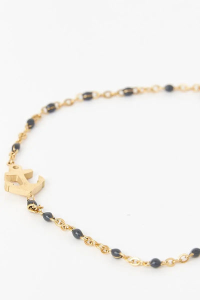 Batela Pulsera o brazalete color dorado con ancla piedra azul. - Batela ÚLTIMAS EDICIONES