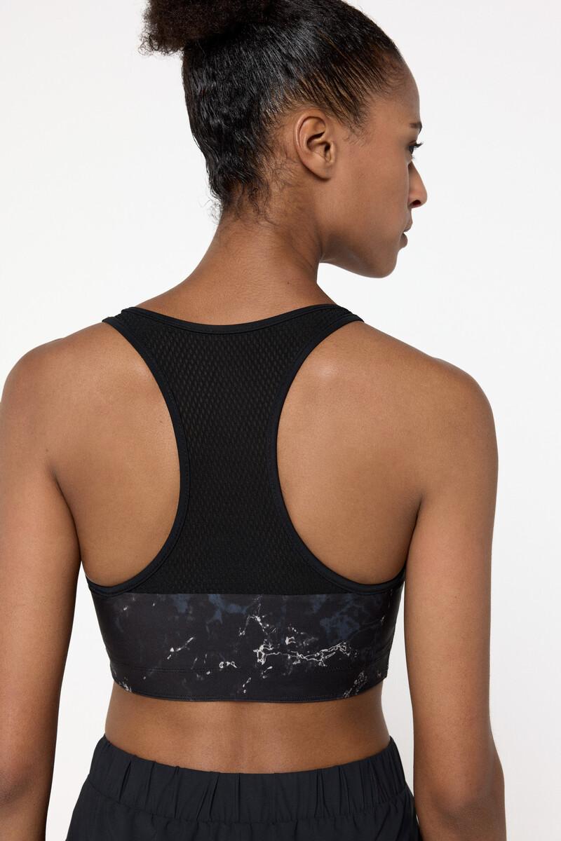 women'secret Sujetador deportivo reversible negro/estampado Ofertas