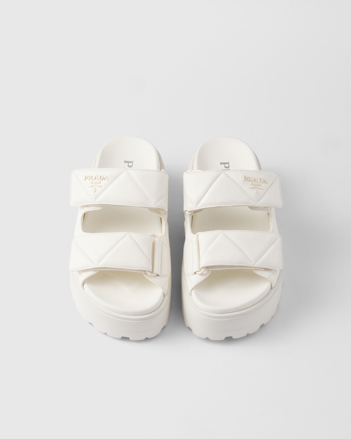 Prada Sandalias planas de napa acolchada Precio ultrabajo