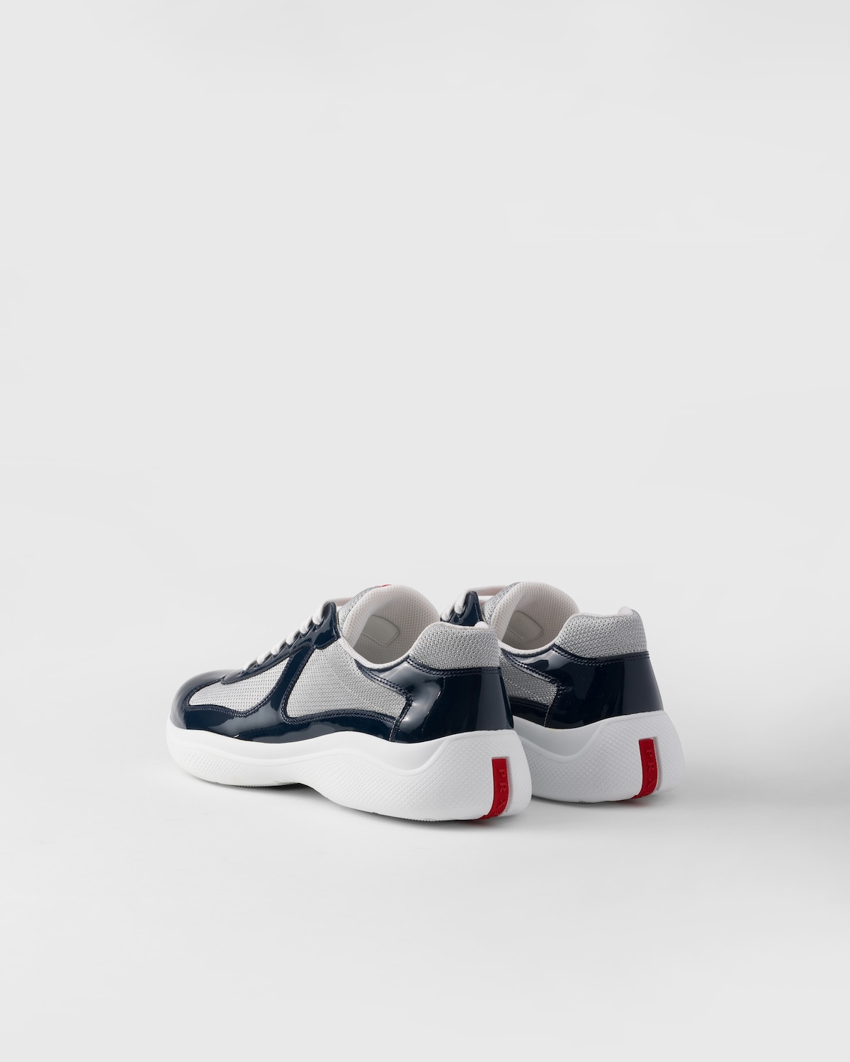 Prada Zapatillas Prada America's Cup de charol y tejido técnico Descuento por venta flash