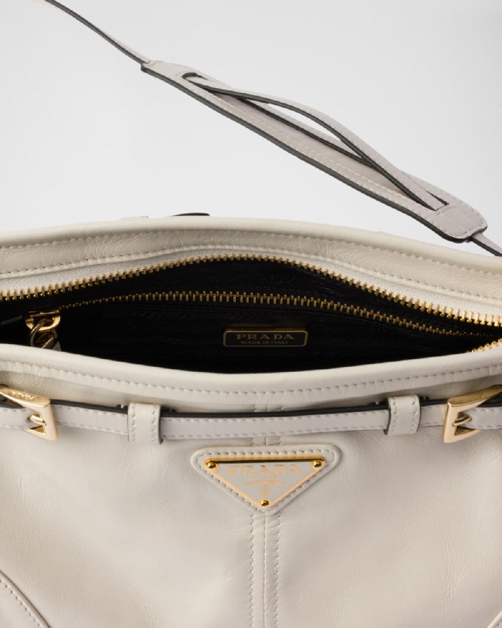 Prada Bandolera pequeña de piel Venta caliente