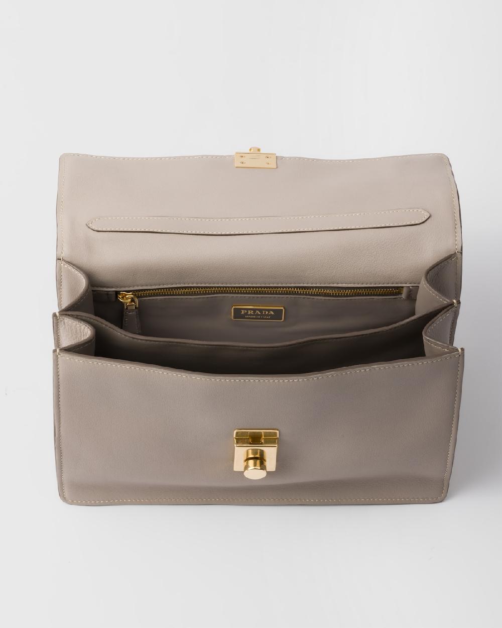 Prada Bolso bandolera Prada Soft Sound de piel mediano Descuento