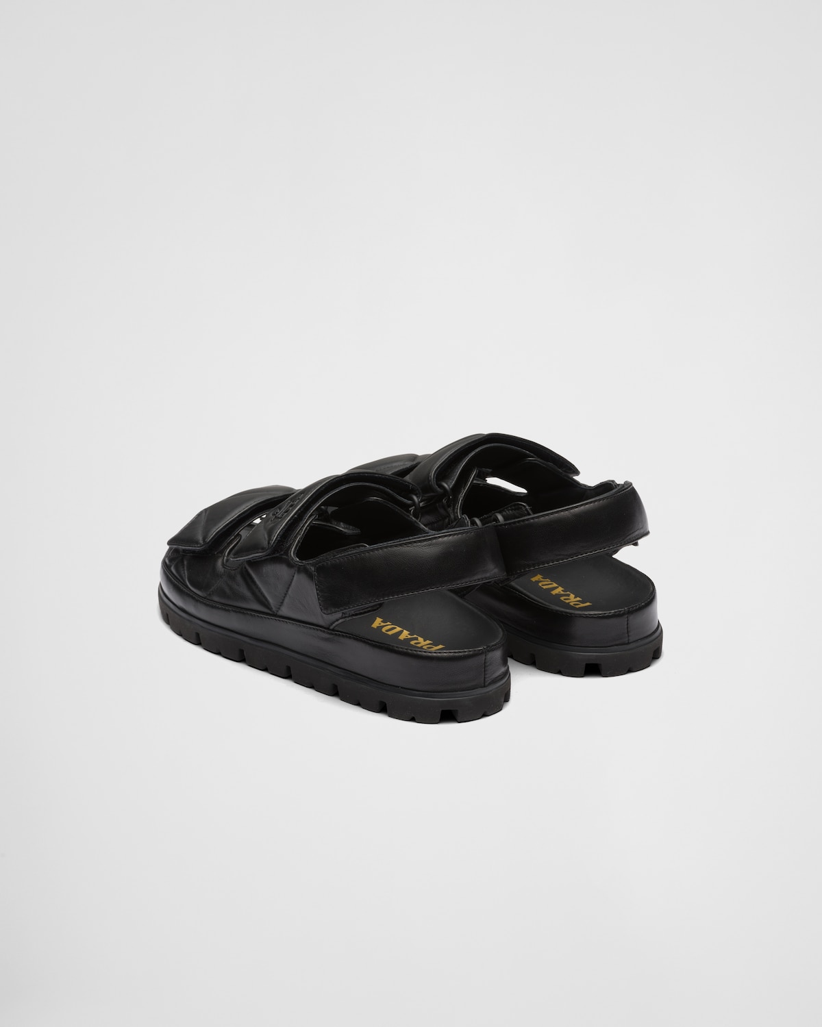 Prada Sandalias de napa acolchadas Precios de Black Friday