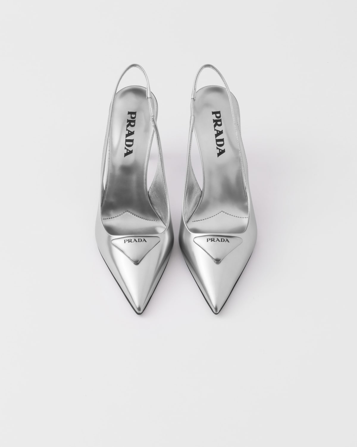 Prada Zapatos de salón destalonados de piel metalizada Ofertas de temporada