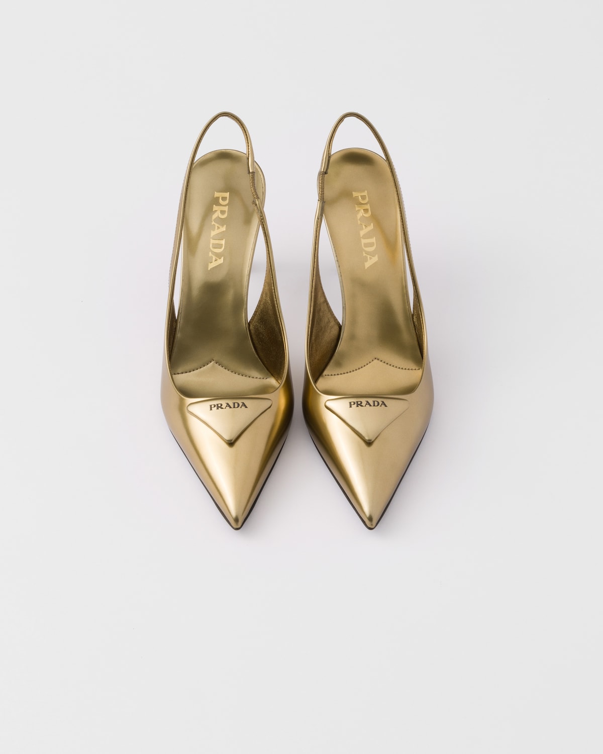 Prada Zapatos de salón destalonados de piel metalizada Ofertas especiales