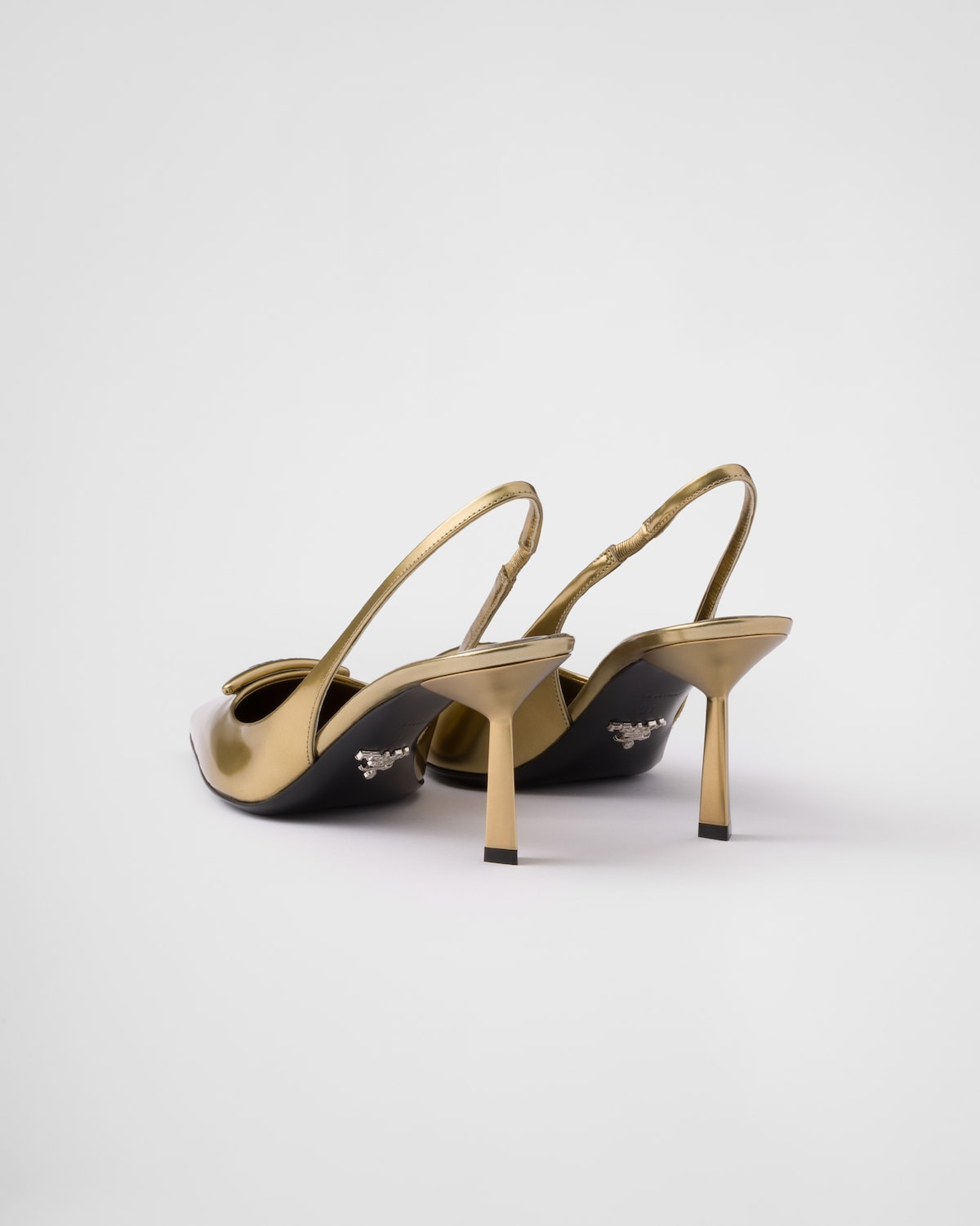 Prada Zapatos de salón destalonados de piel metalizada Ofertas especiales