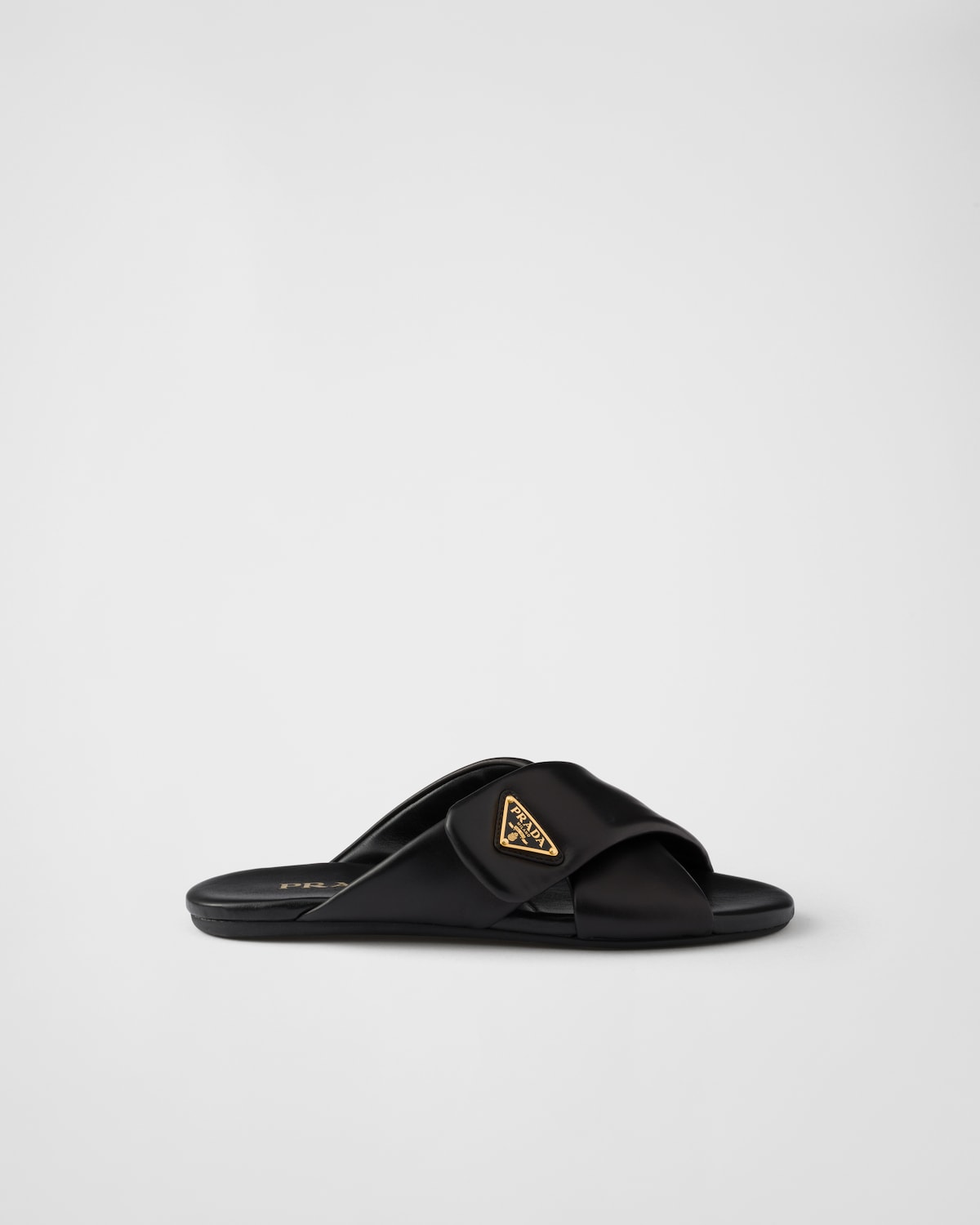 Prada Sandalias planas de napa acolchada