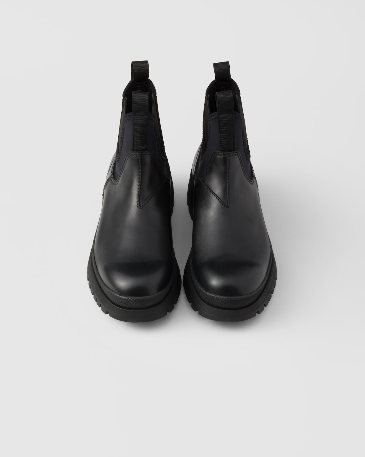 Prada Botas Chelsea de piel y tejido elástico Oferta especial de fábrica