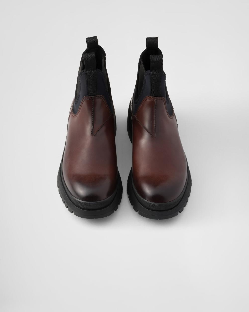 Prada Botas Chelsea de piel y tejido elástico Promoción trimestral