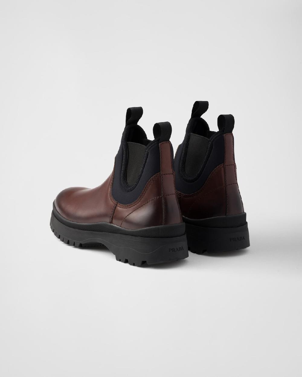 Prada Botas Chelsea de piel y tejido elástico Promoción trimestral