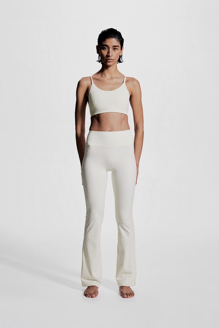 H&M Leggings de deporte acampanados con SoftMove™ - Blanco - MUJER