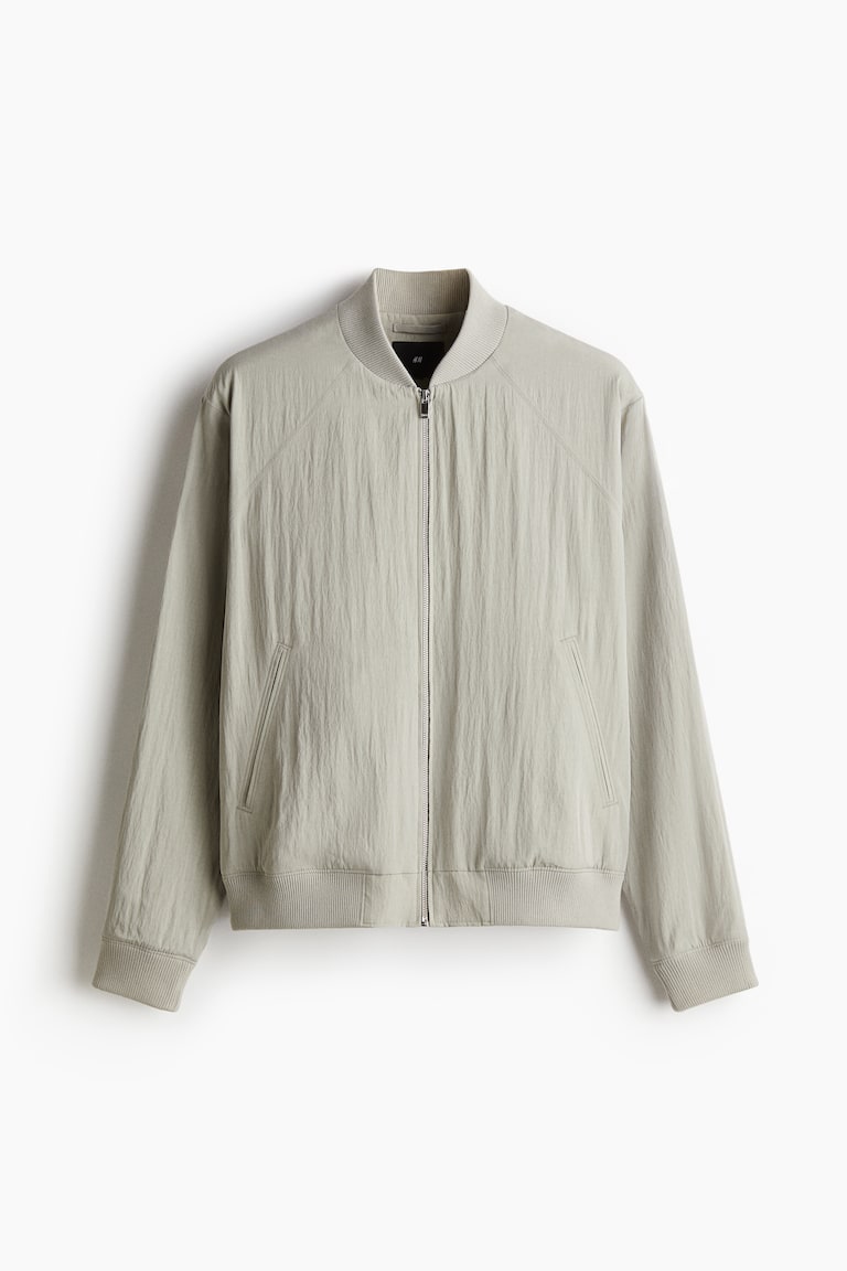 H&M Cazadora bomber en mezcla de lyocell Regular Fit - Beige grisáceo - HOMBRE Limitado a 3 días