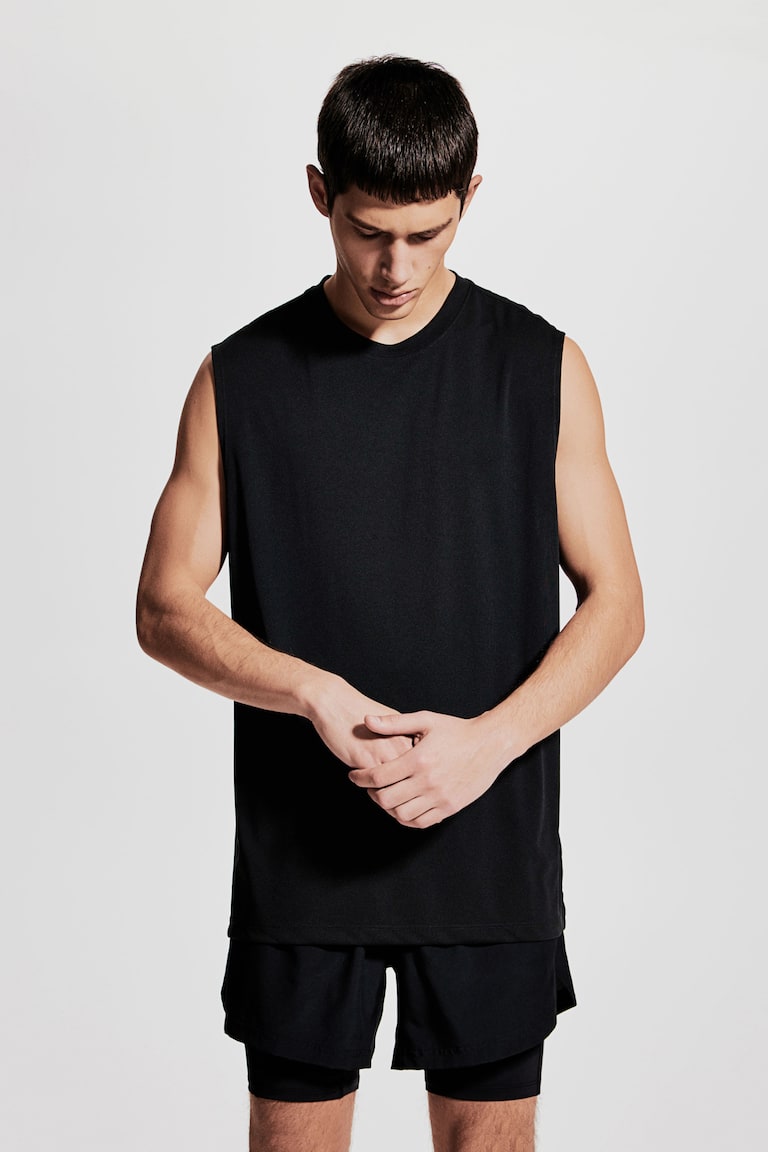 H&M Camiseta de deporte con DryMove™ Regular Fit - Negro - HOMBRE Tienda