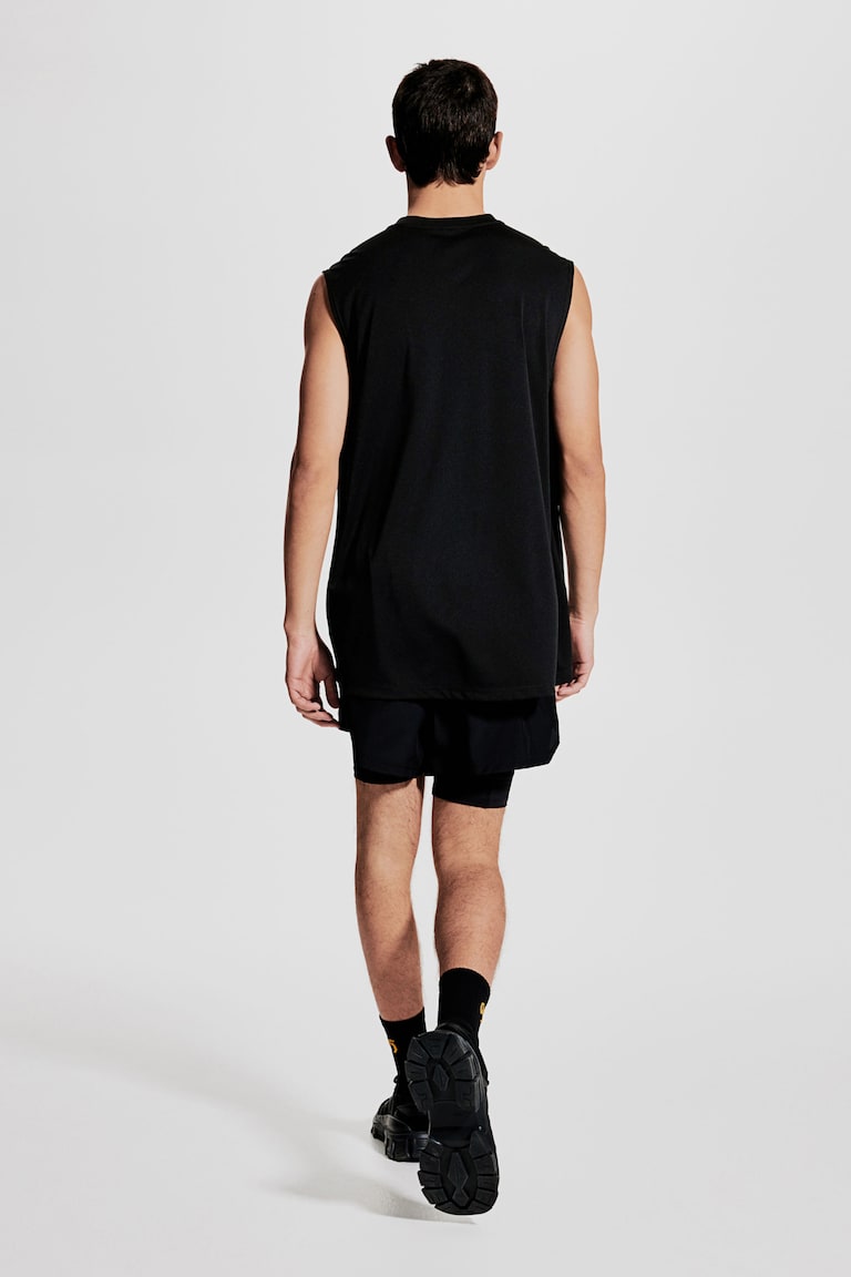 H&M Camiseta de deporte con DryMove™ Regular Fit - Negro - HOMBRE Tienda