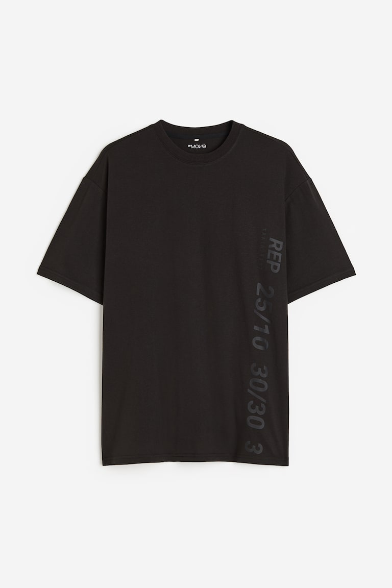 H&M Camiseta de deporte con DryMove™ Loose Fit - Negro/Work Hard - HOMBRE