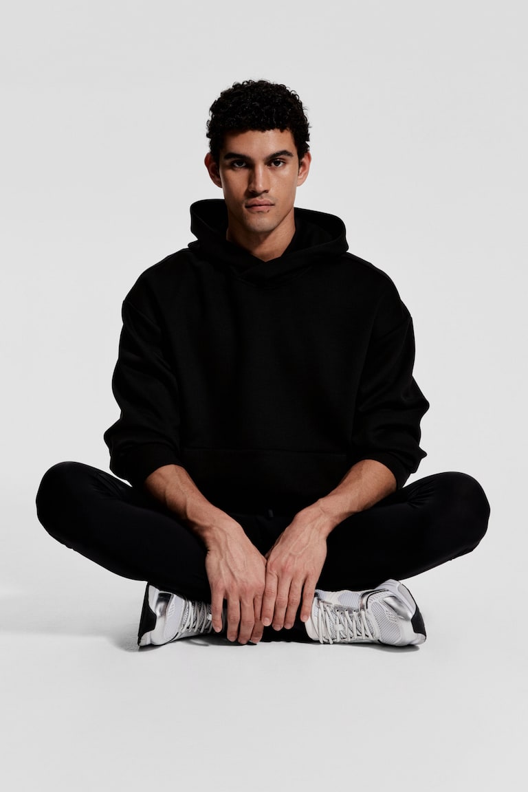 H&M Sudadera de deporte con DryMove™ Loose Fit - Negro - HOMBRE Descuentos del mes