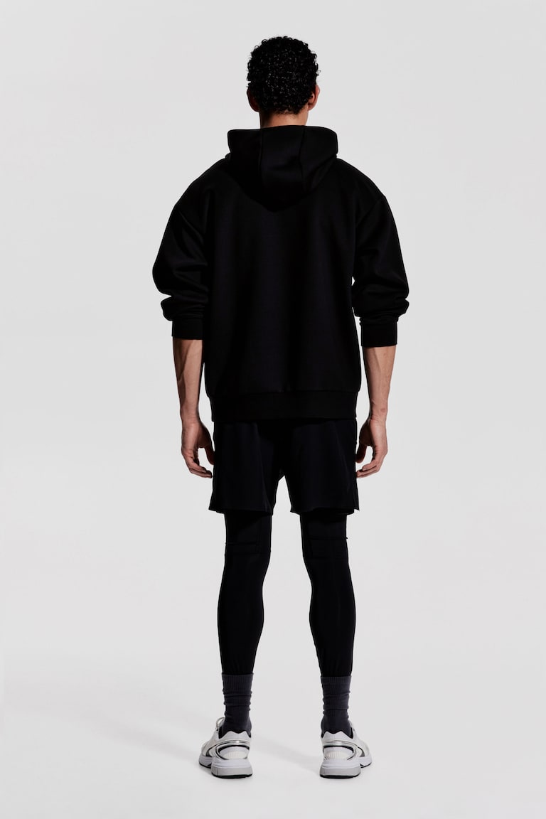 H&M Sudadera de deporte con DryMove™ Loose Fit - Negro - HOMBRE Descuentos del mes