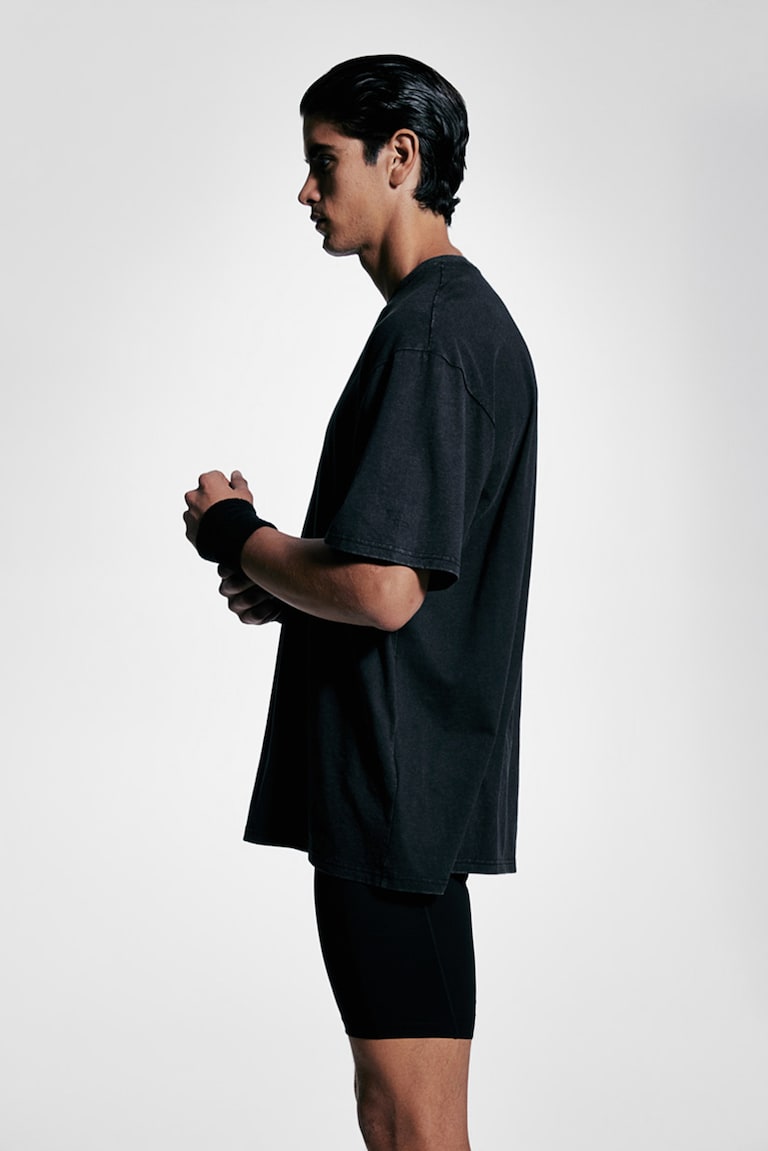 H&M Camiseta de deporte con DryMove™ Loose Fit - Negro - HOMBRE Ofertas de temporada