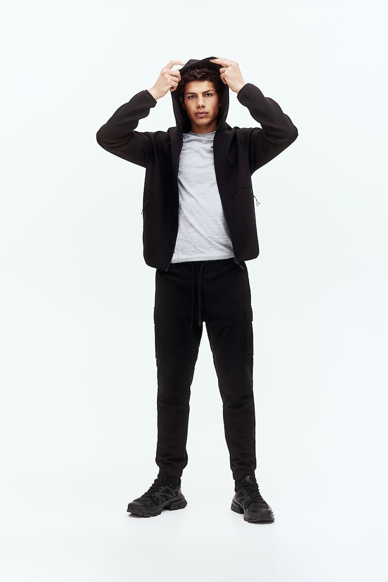 H&M Joggers cargo de algodón con DryMove™ Regular Fit - Negro - HOMBRE Rebajas de fin de temporada