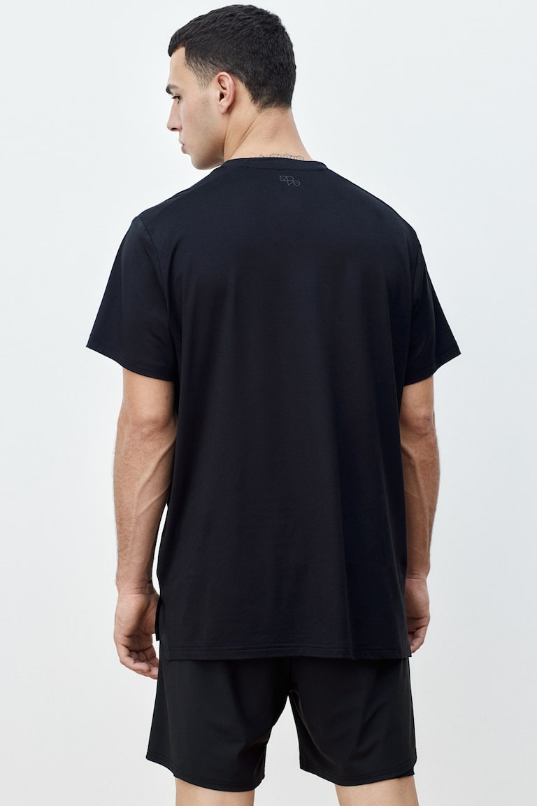 H&M Camiseta de deporte con DryMove™ Regular Fit - Azul oscuro - HOMBRE Precio ultrabajo