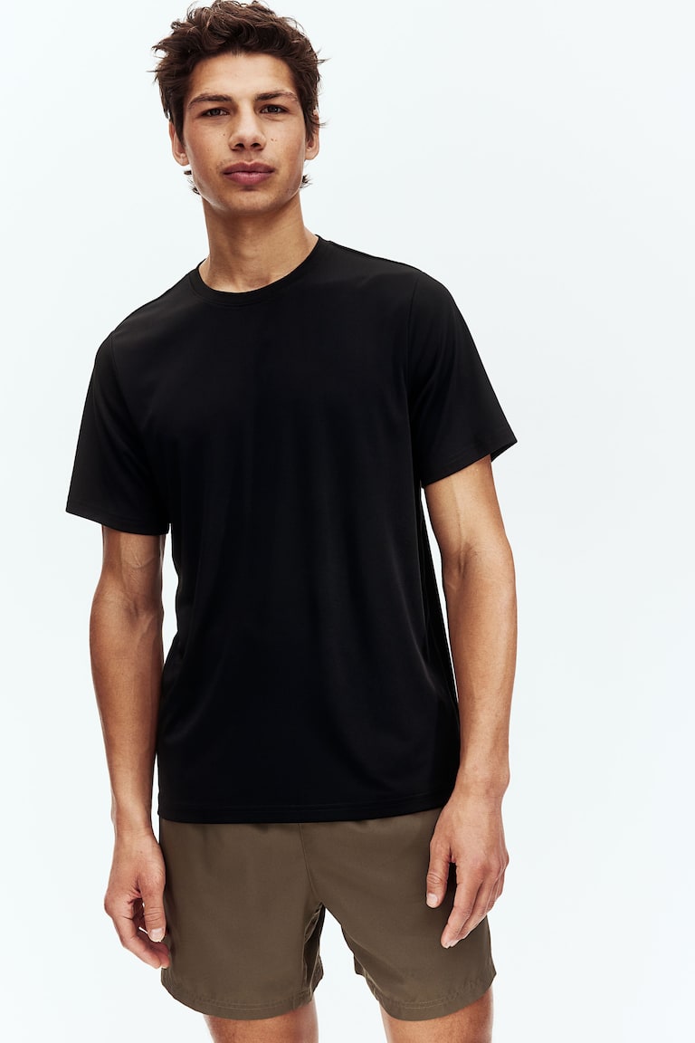 H&M Camiseta de deporte con DryMove™ Regular Fit - Blanco - HOMBRE Rebajas