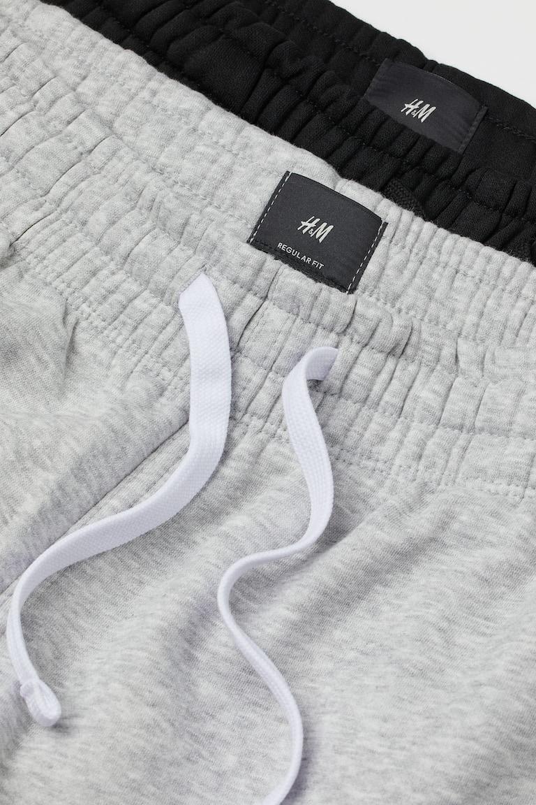 H&M Pack de 2 pantalones de chándal Regular Fit - Negro/Gris jaspeado - HOMBRE Rebajas de fin de temporada