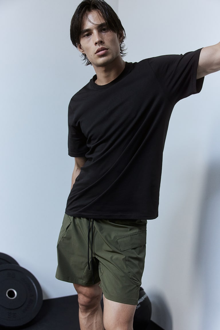 H&M Camiseta de deporte en DryMove™ Regular Fit - Negro - HOMBRE Gran oferta