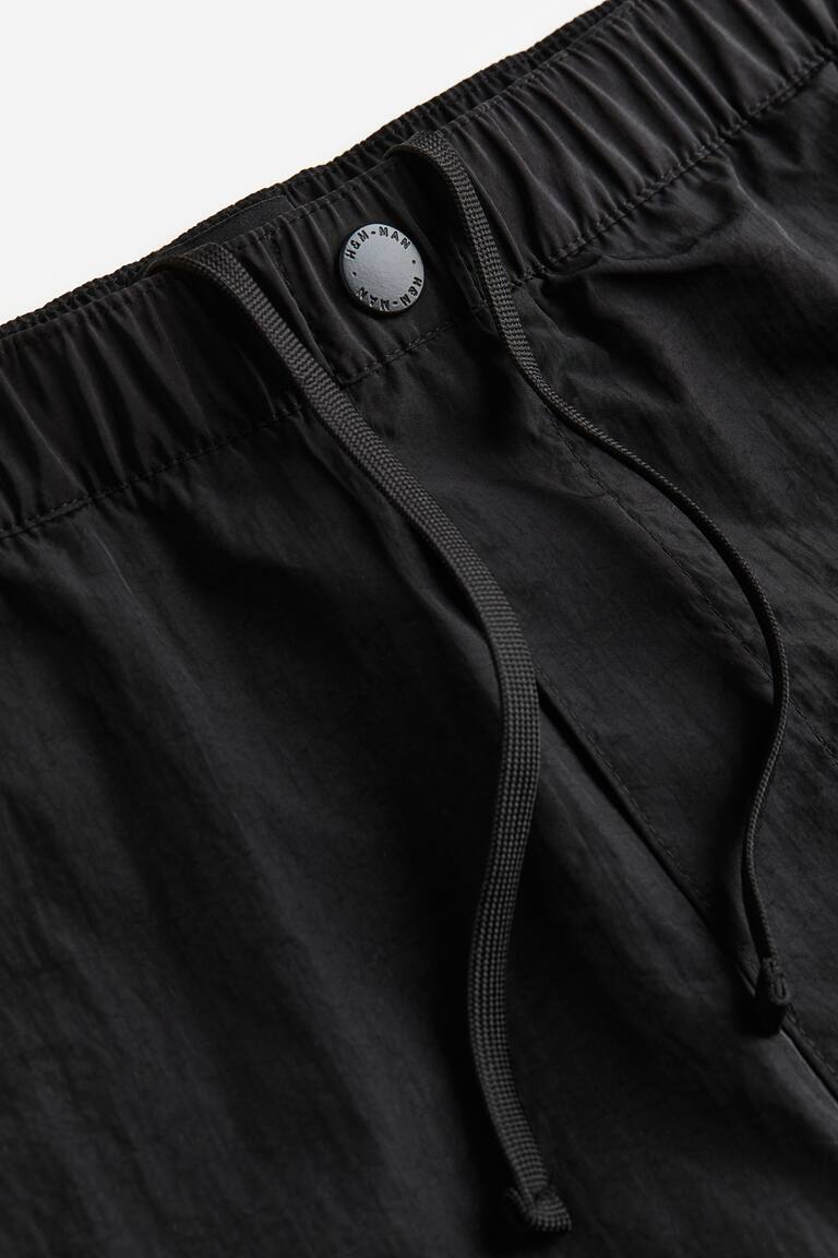 H&M Pantalón corto de nailon Regular Fit - Negro - HOMBRE Liquidación