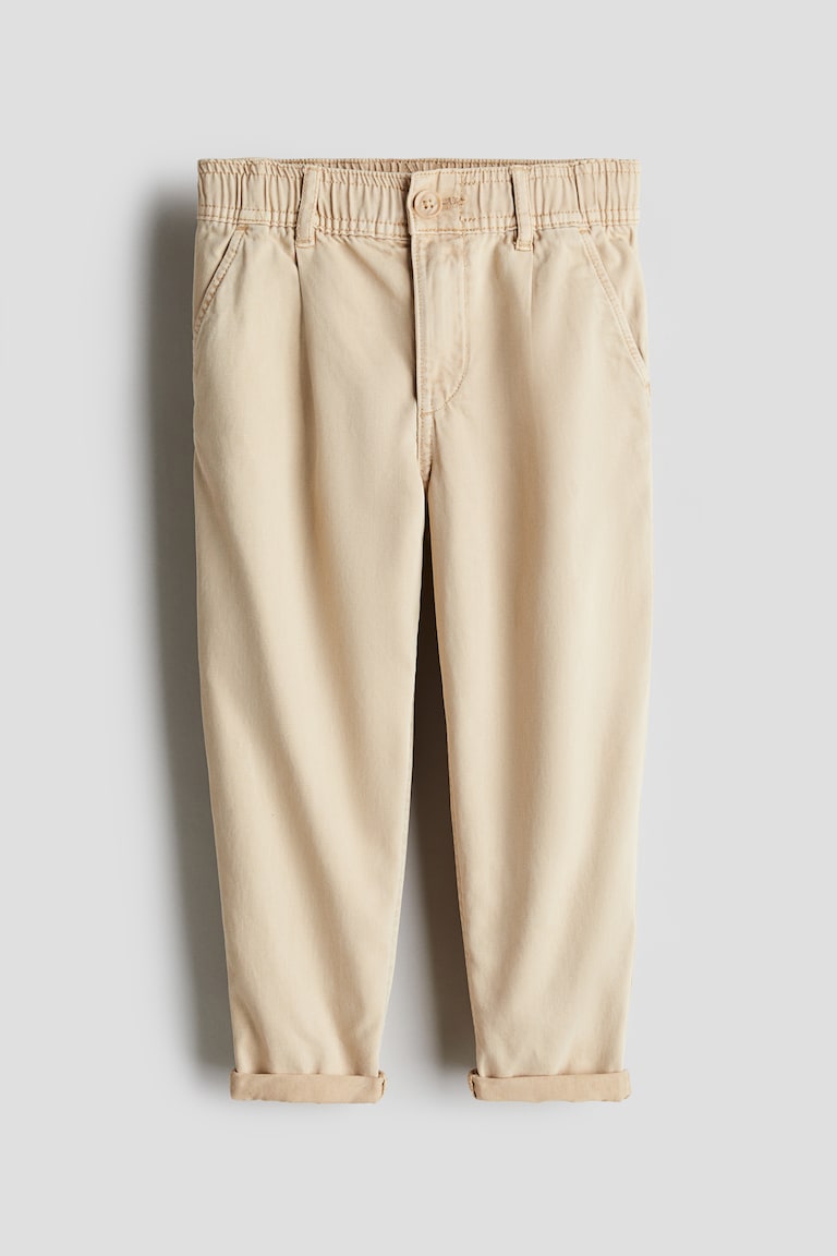H&M Chinos pitillo de corte holgado en sarga - Gris - NIÑOS Superdescuento