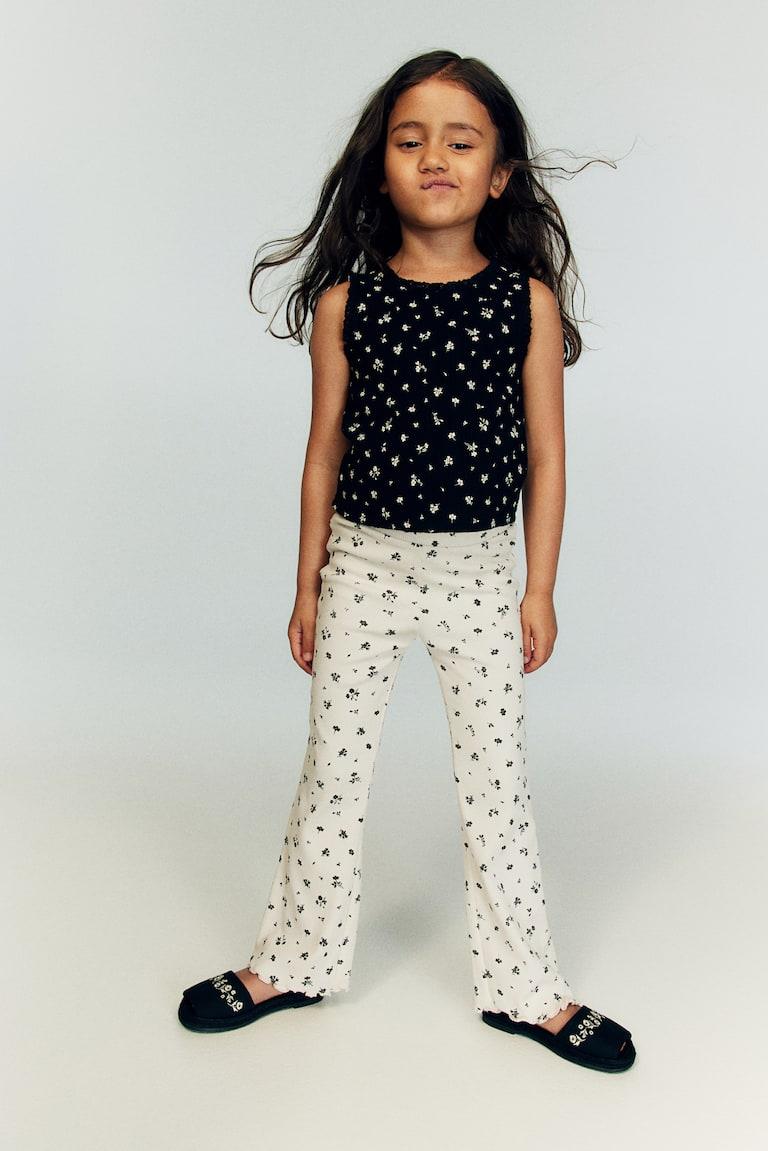 H&M Leggings acampanados - Rosa oscuro/Floral - NIÑOS