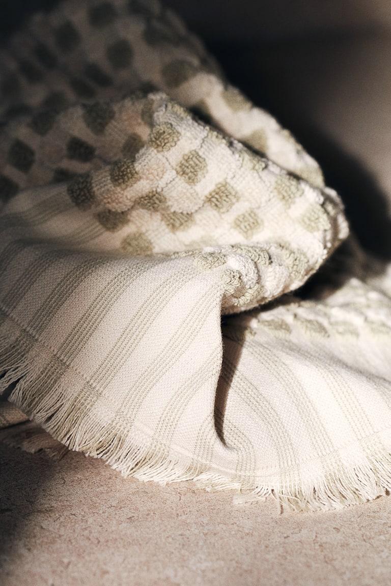H&M Toalla de mano estampada en algodón rizado - Verde/Lunares - HOME Devoluciones gratuitas