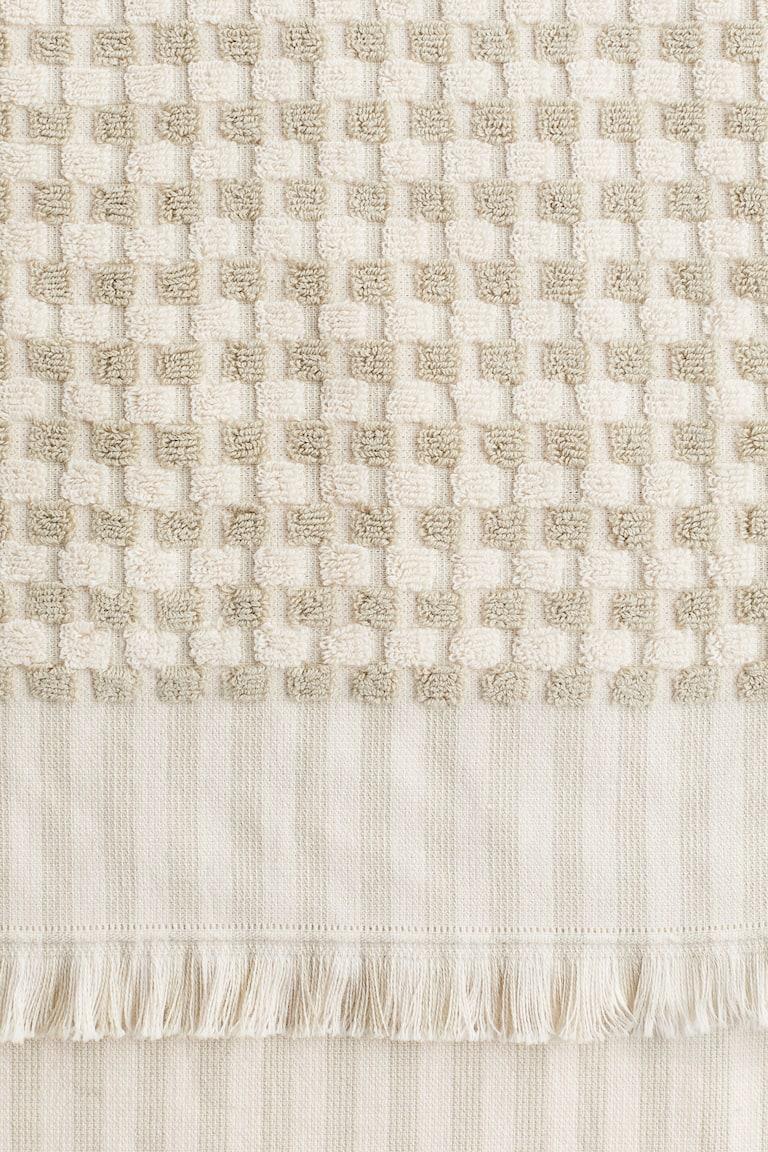 H&M Toalla de mano estampada en algodón rizado - Verde/Lunares - HOME Devoluciones gratuitas